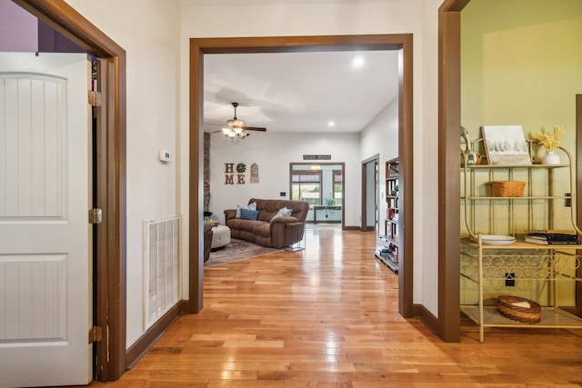 hall featuring light hardwood / wood-style flooring