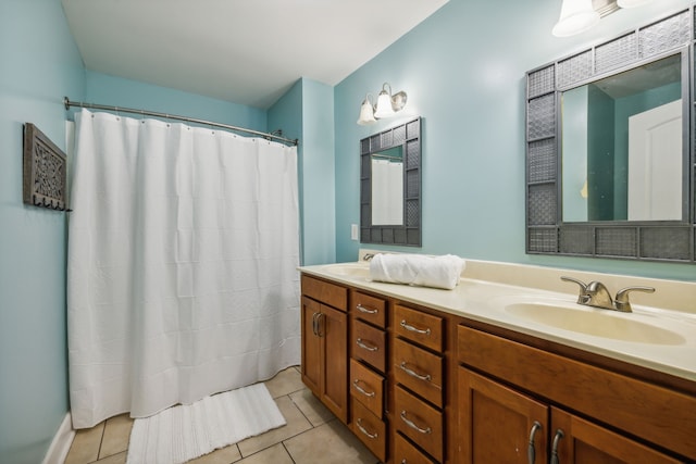 bathroom with vanity, tile patterned flooring, and a shower with shower curtain