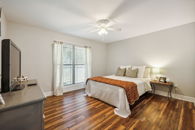 bedroom featuring dark wood-type flooring and ceiling fan