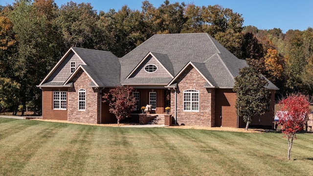 craftsman-style home with a front yard