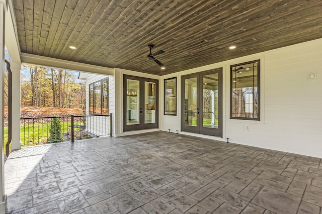 view of patio with ceiling fan and french doors