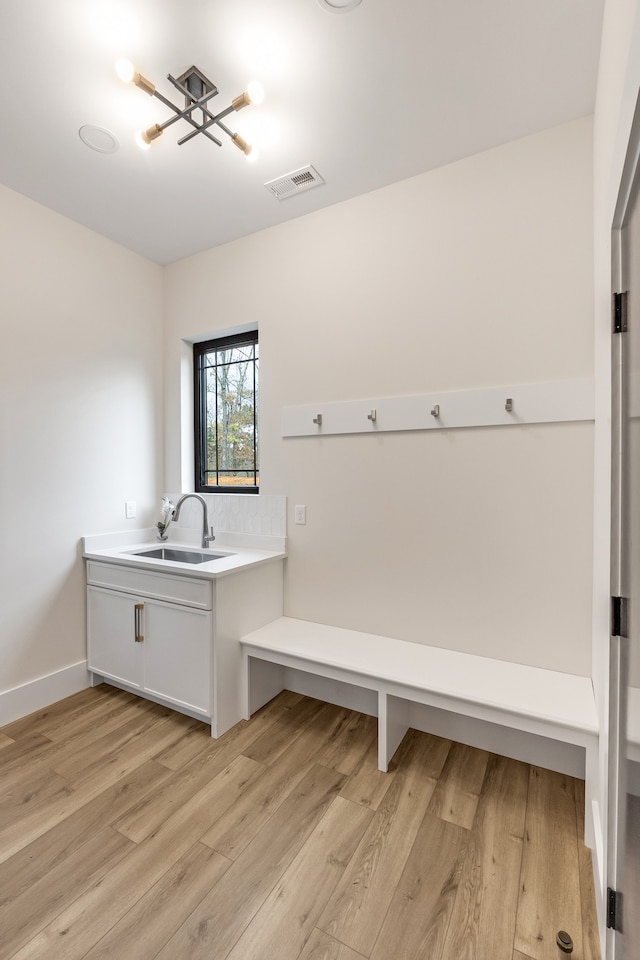 bathroom featuring sink and hardwood / wood-style flooring