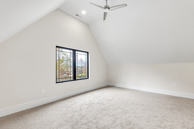 bonus room with ceiling fan, carpet floors, and vaulted ceiling