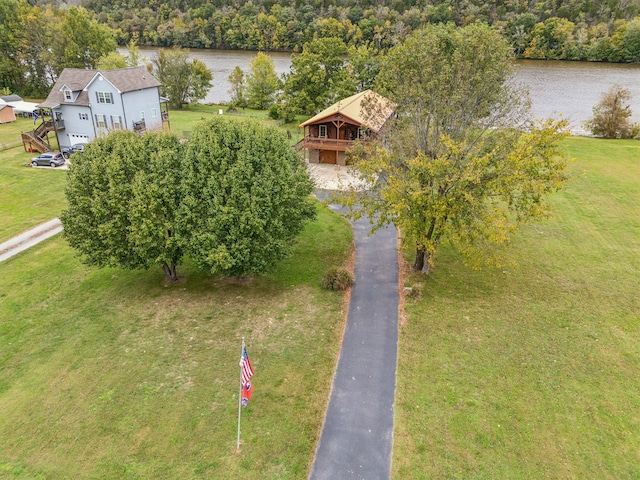 birds eye view of property with a water view