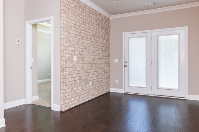 interior space featuring crown molding and dark hardwood / wood-style flooring