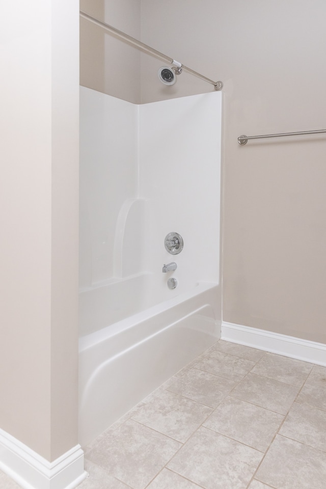 bathroom with shower / bathing tub combination and tile patterned flooring