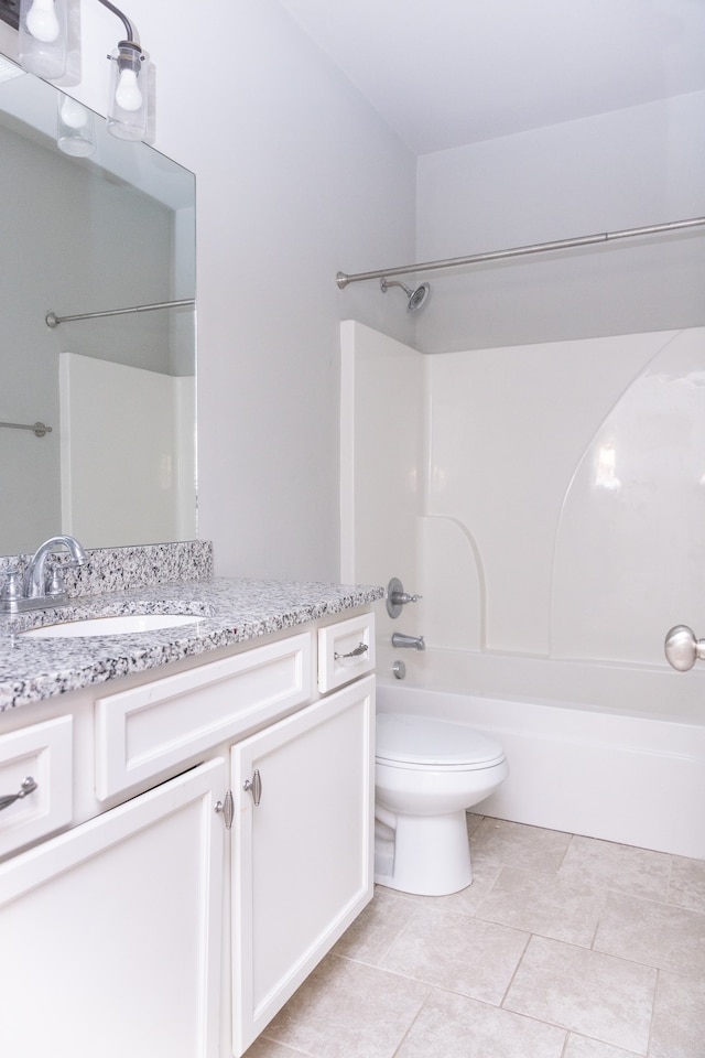 full bathroom featuring vanity, toilet, bathtub / shower combination, and tile patterned floors