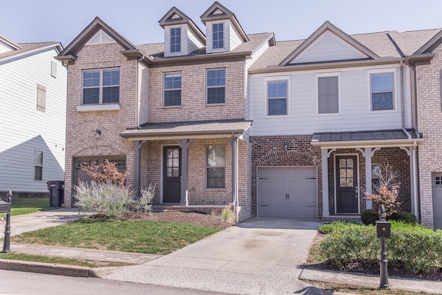 townhome / multi-family property featuring a porch and a garage