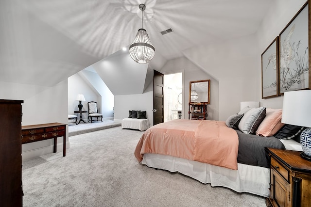 bedroom with vaulted ceiling, carpet floors, and an inviting chandelier