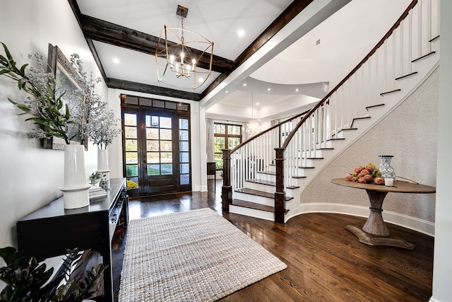 entryway featuring dark wood-type flooring and beamed ceiling