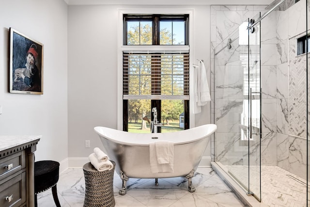 bathroom with vanity and separate shower and tub