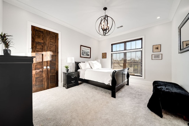 carpeted bedroom with ornamental molding and an inviting chandelier