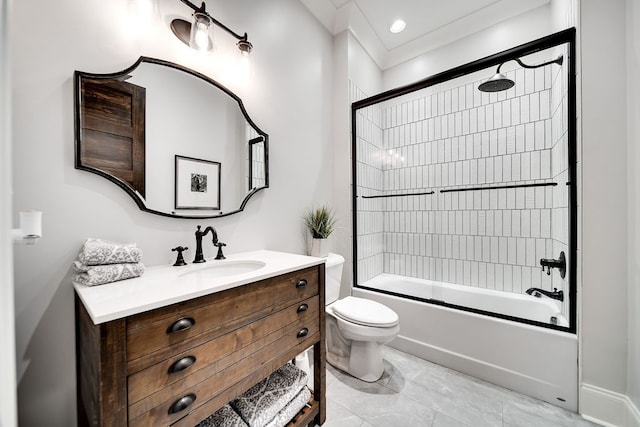 full bathroom with vanity, combined bath / shower with glass door, ornamental molding, and toilet