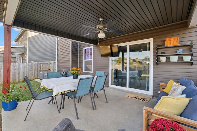 view of patio featuring ceiling fan