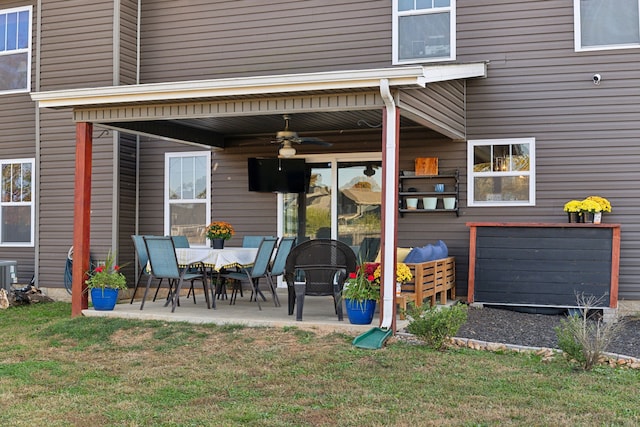 exterior space featuring ceiling fan