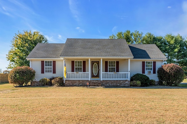 view of front of house featuring a porch and a front lawn