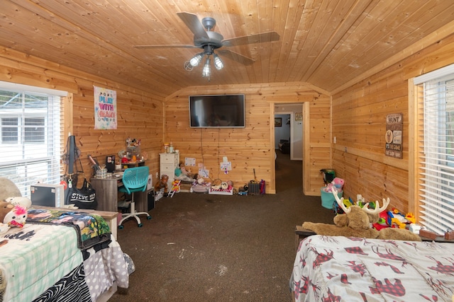 bedroom featuring wood ceiling, carpet, ceiling fan, vaulted ceiling, and wooden walls