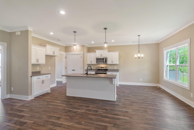 kitchen with a sink, dark wood-style flooring, dark countertops, baseboards, and appliances with stainless steel finishes