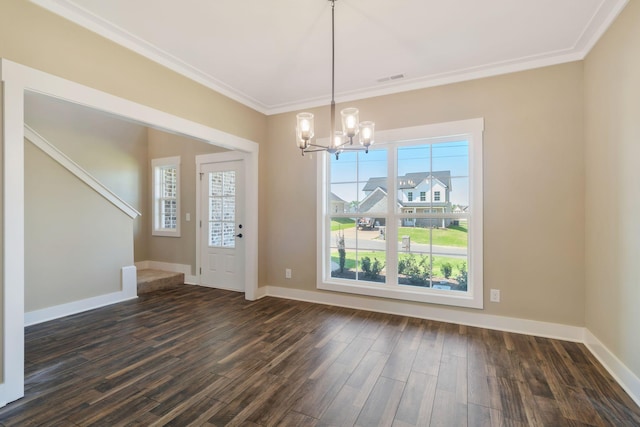 unfurnished dining area featuring crown molding, baseboards, a notable chandelier, and dark wood finished floors