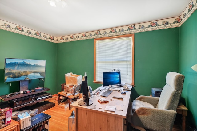 office with wood-type flooring