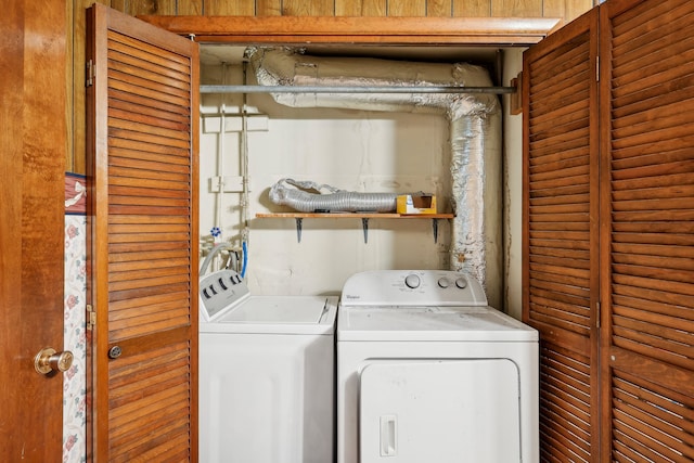 clothes washing area with washer and dryer