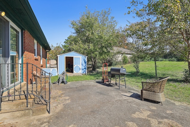 view of patio / terrace featuring a storage unit and grilling area