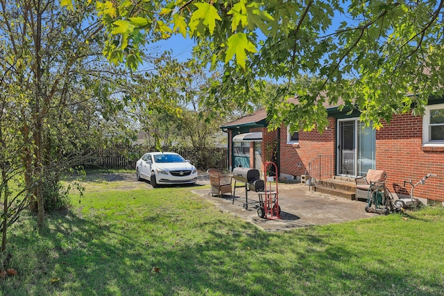 view of yard with a patio area