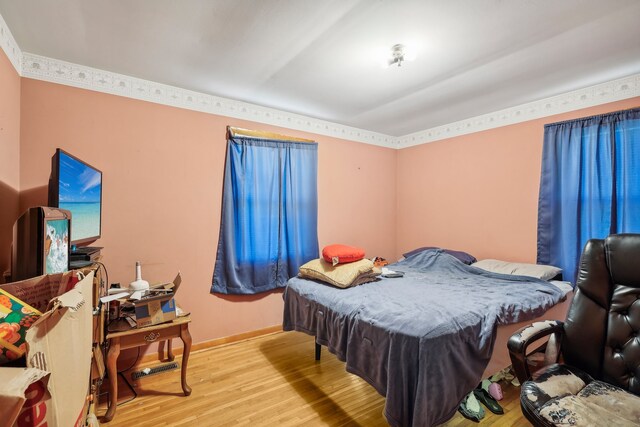 bedroom featuring light wood-type flooring