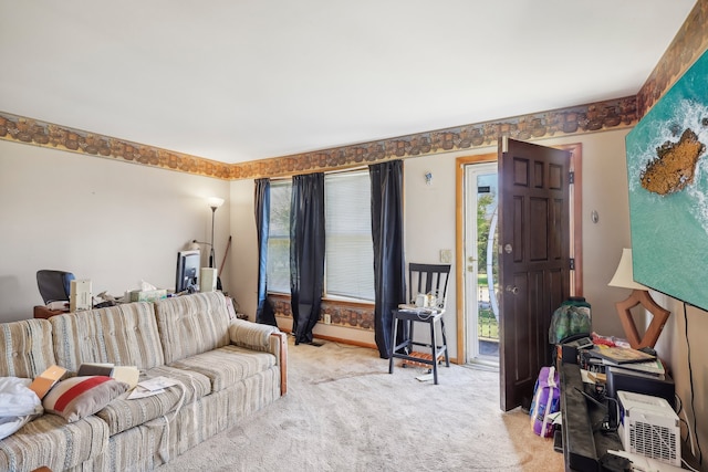 carpeted living room featuring a wealth of natural light