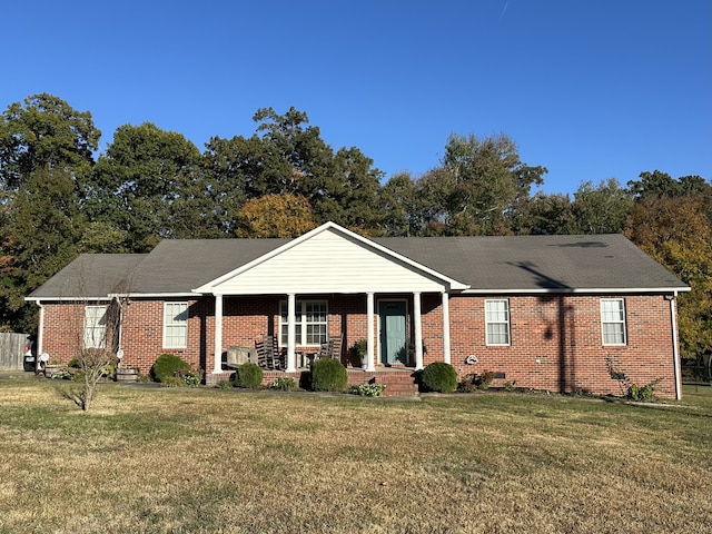 ranch-style house with a front yard