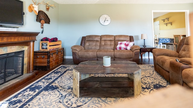 living room featuring dark wood-type flooring