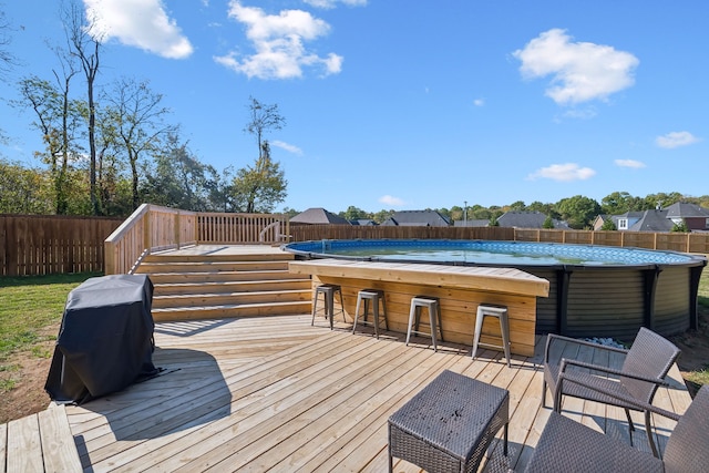 deck with a hot tub