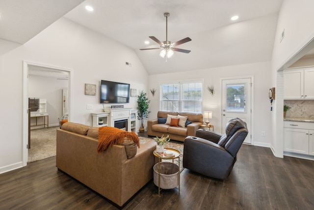 living room featuring ceiling fan, high vaulted ceiling, and dark hardwood / wood-style flooring