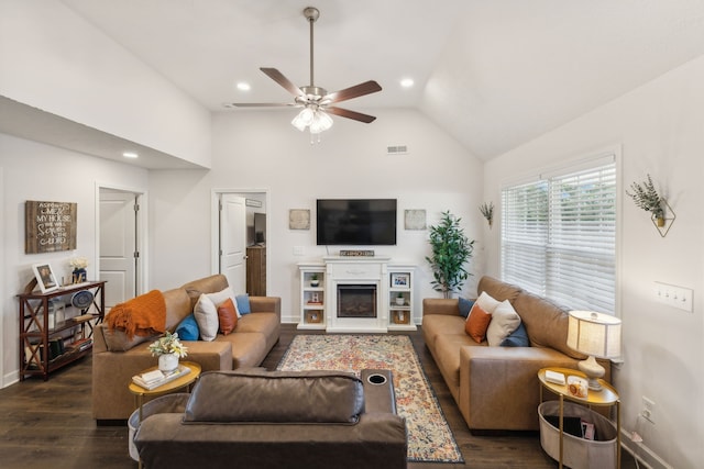 living room featuring high vaulted ceiling, dark wood-type flooring, and ceiling fan