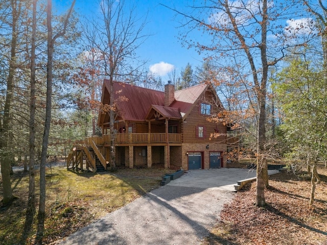 cabin featuring a garage