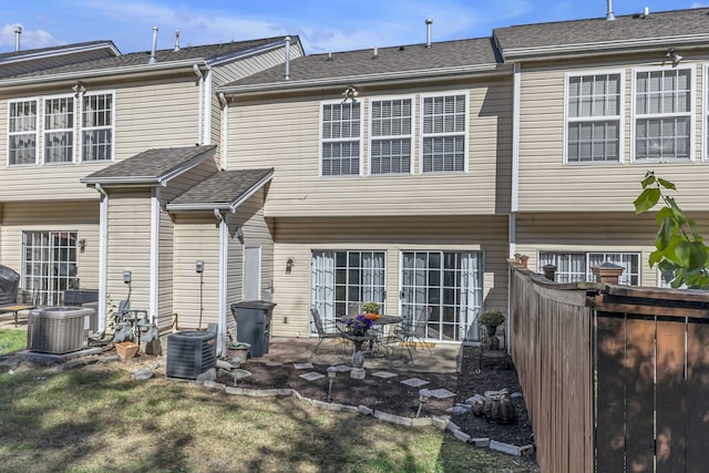 back of house featuring a patio area and cooling unit