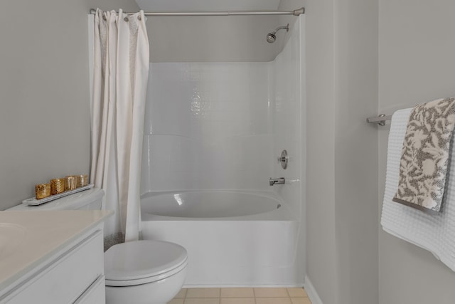 full bathroom with toilet, vanity, tile patterned floors, and shower / tub combo