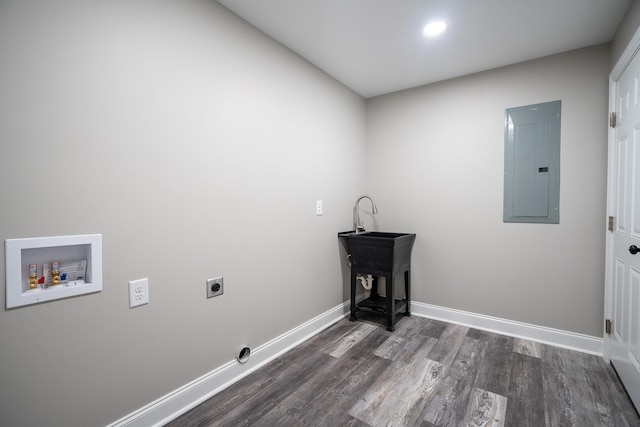 laundry area featuring baseboards, electric panel, laundry area, hookup for a washing machine, and hookup for an electric dryer