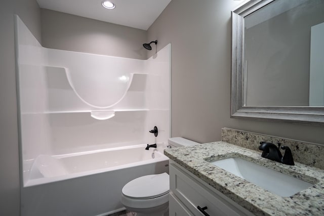 full bath with vanity, toilet, and shower / bathtub combination