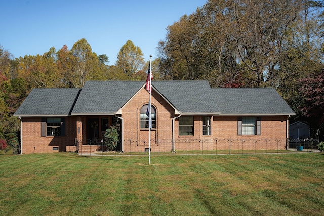 single story home with a front yard