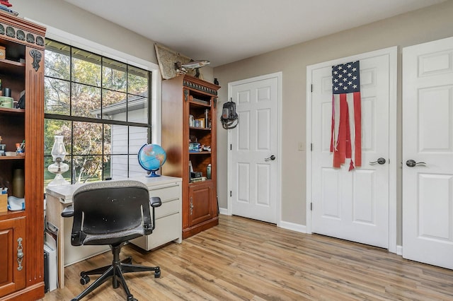office area featuring light wood finished floors