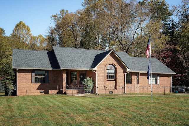 single story home featuring crawl space, brick siding, and a front yard