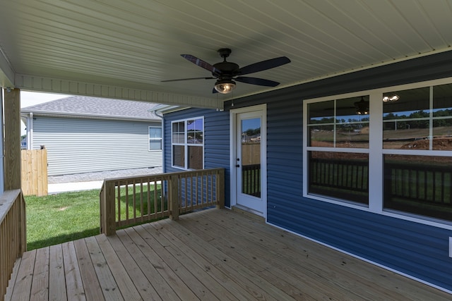 wooden terrace featuring a ceiling fan