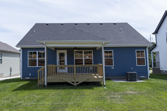 back of house featuring a yard, cooling unit, roof with shingles, and crawl space