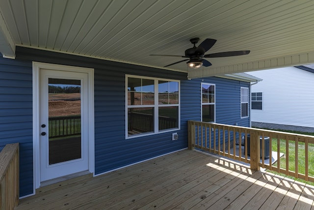 wooden terrace featuring ceiling fan