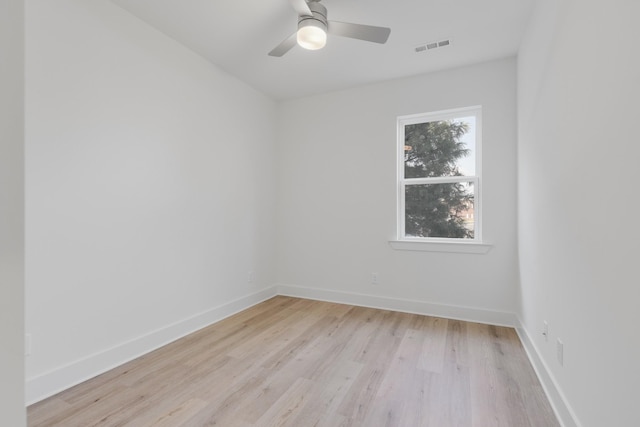 unfurnished room with ceiling fan and light hardwood / wood-style flooring