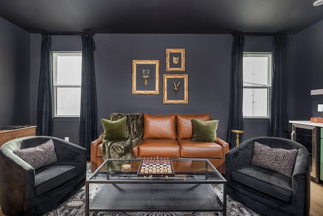 living room with hardwood / wood-style flooring and wine cooler