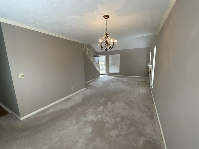 interior space with crown molding, a textured ceiling, and a chandelier