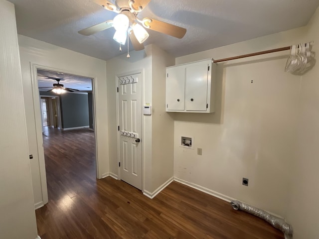 laundry room featuring cabinets, electric dryer hookup, washer hookup, and dark hardwood / wood-style flooring