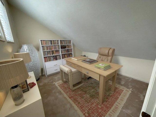 office space featuring lofted ceiling